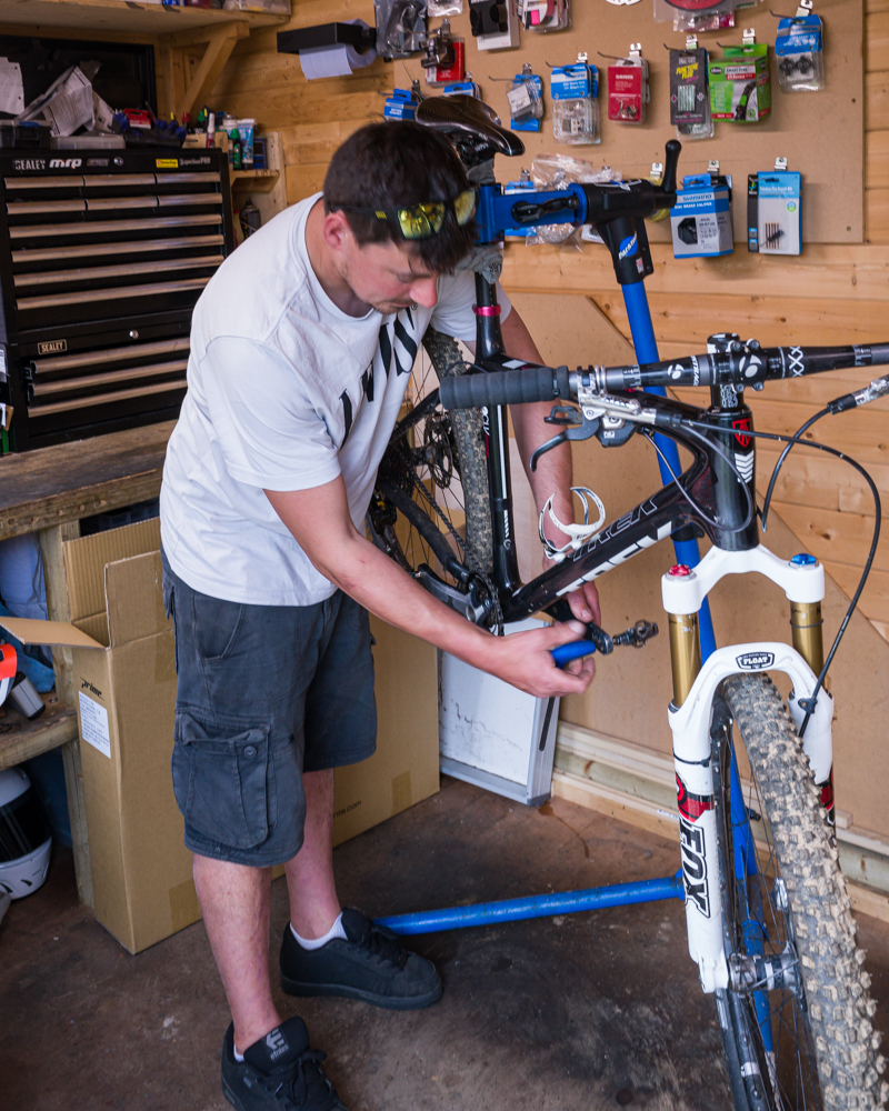 Gary Robert fixing a bike