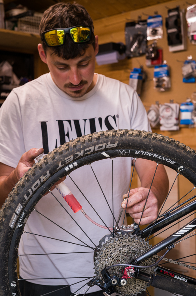 Gary Robert fixing a bike