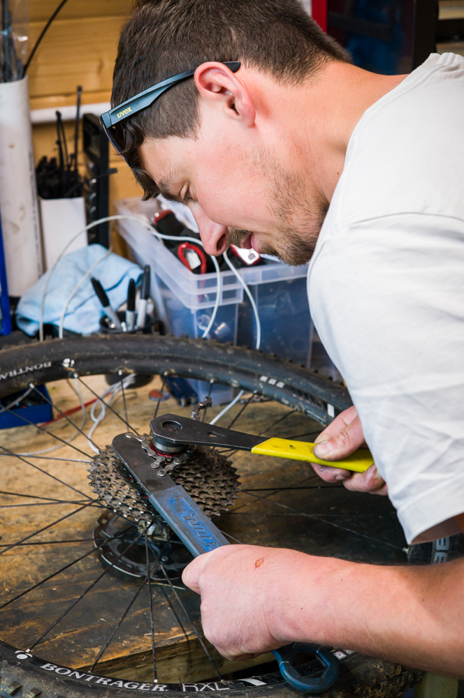 Gary Robert fixing a bike